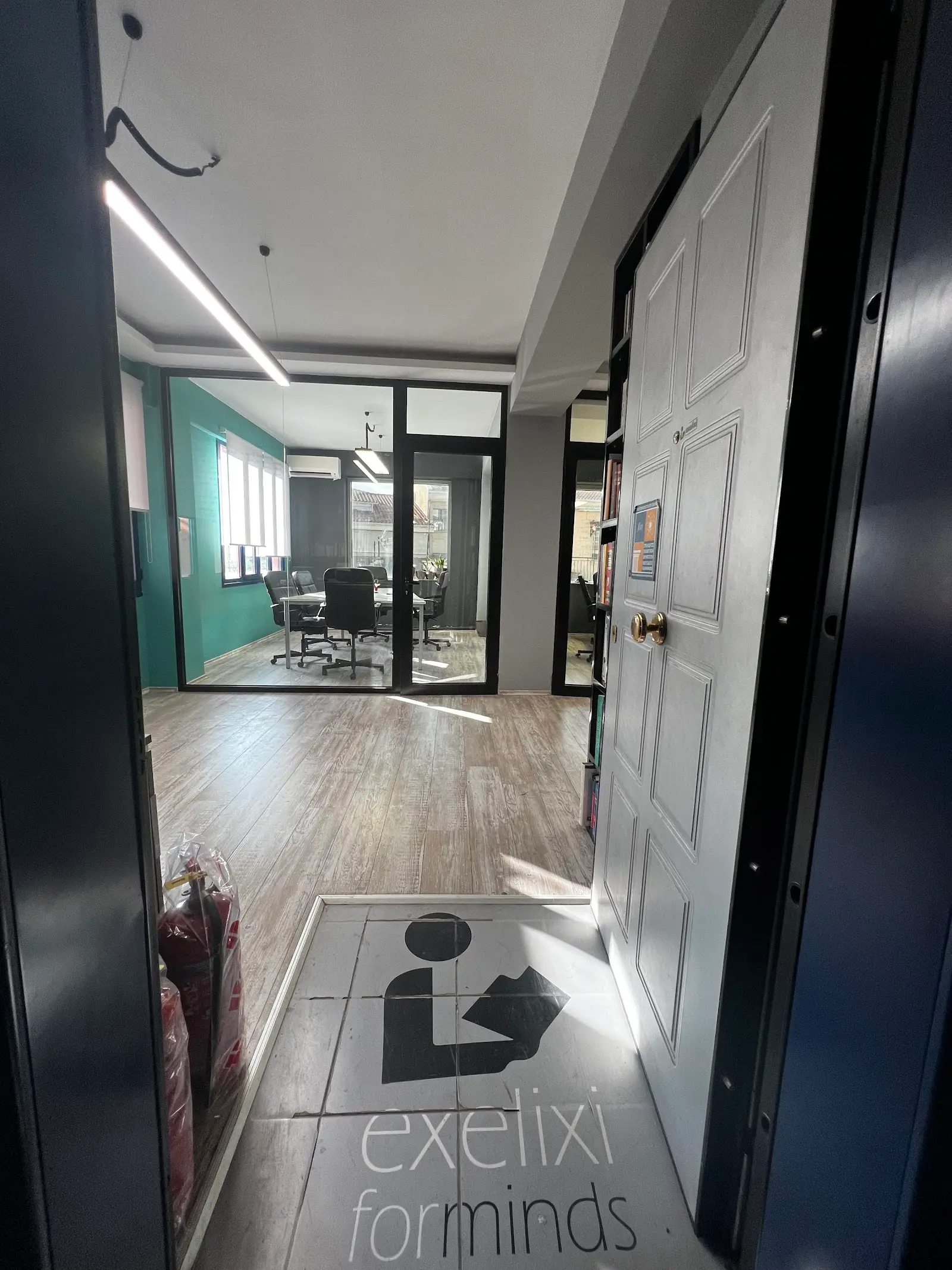The entrance to Exelixi For Minds and the corridor leading to the classrooms.